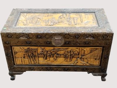 a wooden box with a painting on the inside