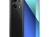 the back and side view of a black smartphone with a blue screen