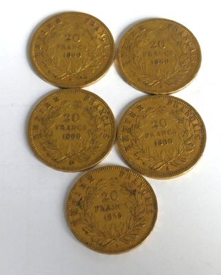 five gold coins with the names of different countries on them