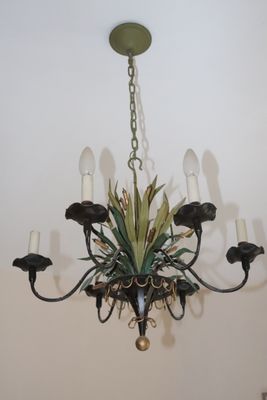 a chandelier hanging from the ceiling in a room