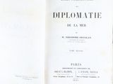 an open book with a black and white title on it