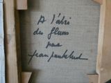 a picture of a piece of art with writing on it