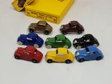 a lot of toy cars that are sitting on a table