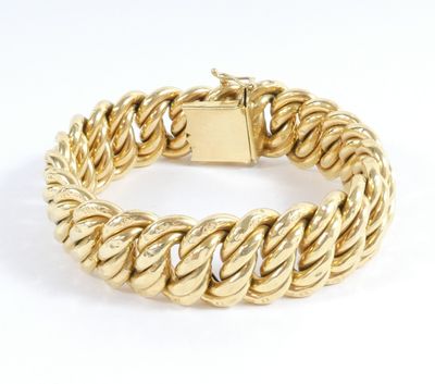 an 18k yellow gold bracelet with a twisted rope design