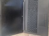 two laptops that are open on a table