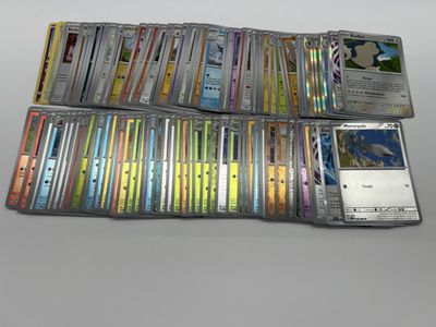 many different types of pokemon cards on the table