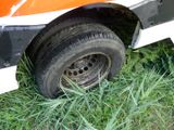 a close up of a tire on the side of a truck