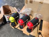 four different types of blowers on a pallet next to a cardboard box