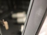 a close up view of a metal door with a key on it