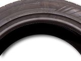 the tire of a car is shown on a white background