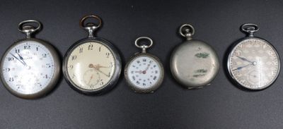 six antique pocket watches are lined up in a row on a black surface