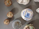 many different types of decorative boxes on the table