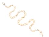a close up of a rosary on a white background