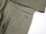 an image of a close up of a pair of pants on a white surface