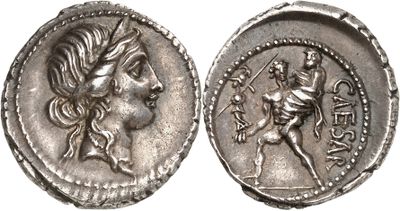 a silver coin with an image of a woman holding a sword