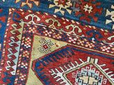 a close up of a rug with a cat on it