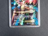 a close up of a card in a plastic case on a table