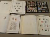 a lot of different stamps on the pages of a book