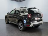 a picture of a black car parked in a garage