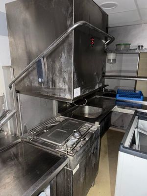 an image of a commercial kitchen with stainless steel appliances