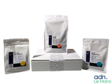 three bags of coffee sitting next to each other on a table
