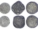 six ancient roman coins from the time of the roman empire