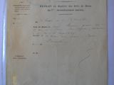 an old document with writing on it sitting on top of a table