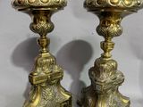 pair of antique brass candlesticks with lion heads