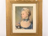 portrait d'une jeune fille en robe bleue tenant un chaton dans ses bras