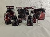 a lot of wine glasses sitting on a table