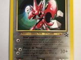 a close up of a pokemon card on a white surface