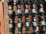a lot of different types of valves on the wall