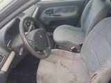 a dirty car that is parked in the lot