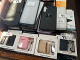 boxes of cell phones are stacked on top of each other on a table