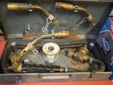 a metal case with a bunch of pipes in it