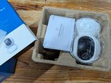 a box with a camera inside of it on a table