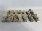 a lot of military vehicles that are sitting on a table