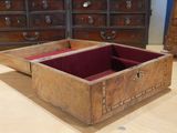 a wooden box that is open on a table