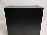 an image of a black box sitting on top of a white surface