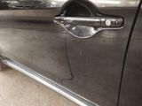a close up of a door handle on a car