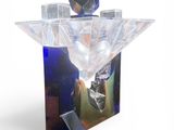 a picture of a glass vase with a diamond on it