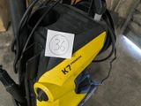 a yellow and black machine that is sitting on the floor