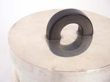 a metal container with a ring on top of it