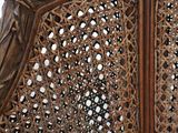 a close up of a chair made out of wood