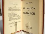 a book open to a page with a picture of a man in a rose