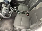 the interior of a car with a steering wheel, dashboard, and dashboard controls