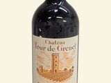 a bottle of wine that is sitting on a table
