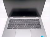 a laptop computer that is sitting on a table