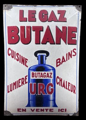 sign of a blue bottle of lubrie urc on the side of a building