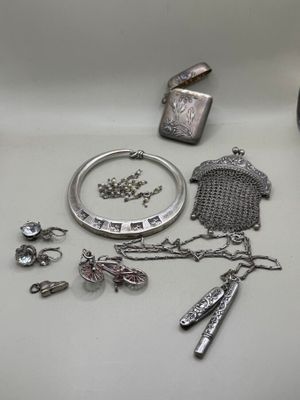 a lot of silver items that are on the table